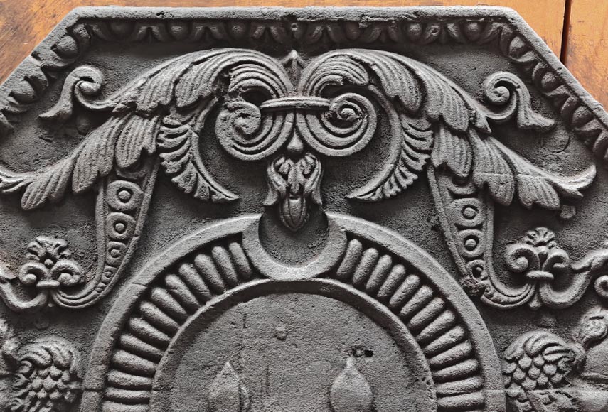 Cast iron fireplace plaque bearing the Arms of France, framed by cherubs Cast iron fireplace plaque bearing the Arms of France, framed by cherubs-1