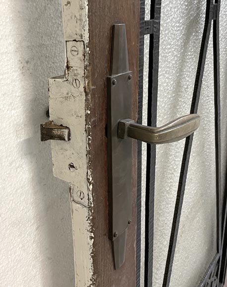 Art Deco interior door in wood and wrought metal, featuring geometric ornamentation and textured glass Art Deco interior door in wood and wrought metal, featuring geometric ornamentation and textured glass-6