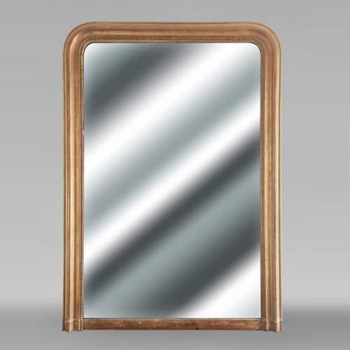 Gilt Louis-Philippe style trumeau mirror with a beaded border