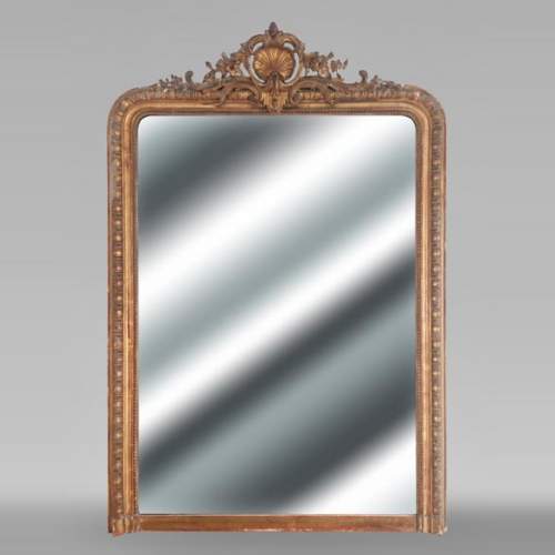 Richly decorated Louis XV style gilt trumeau mirror