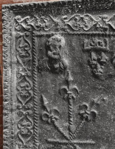 Cast-iron fireback decorated with a coat of arms and a portrait bust-1