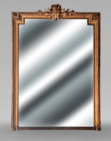 Richly decorated Louis XVI style gilt trumeau mirror-0