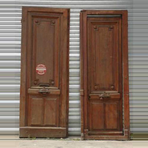 A pair of wooden monumental doors. 