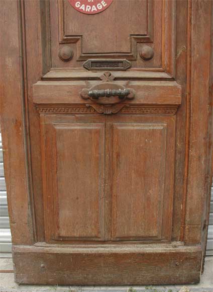 A pair of wooden monumental doors. -4
