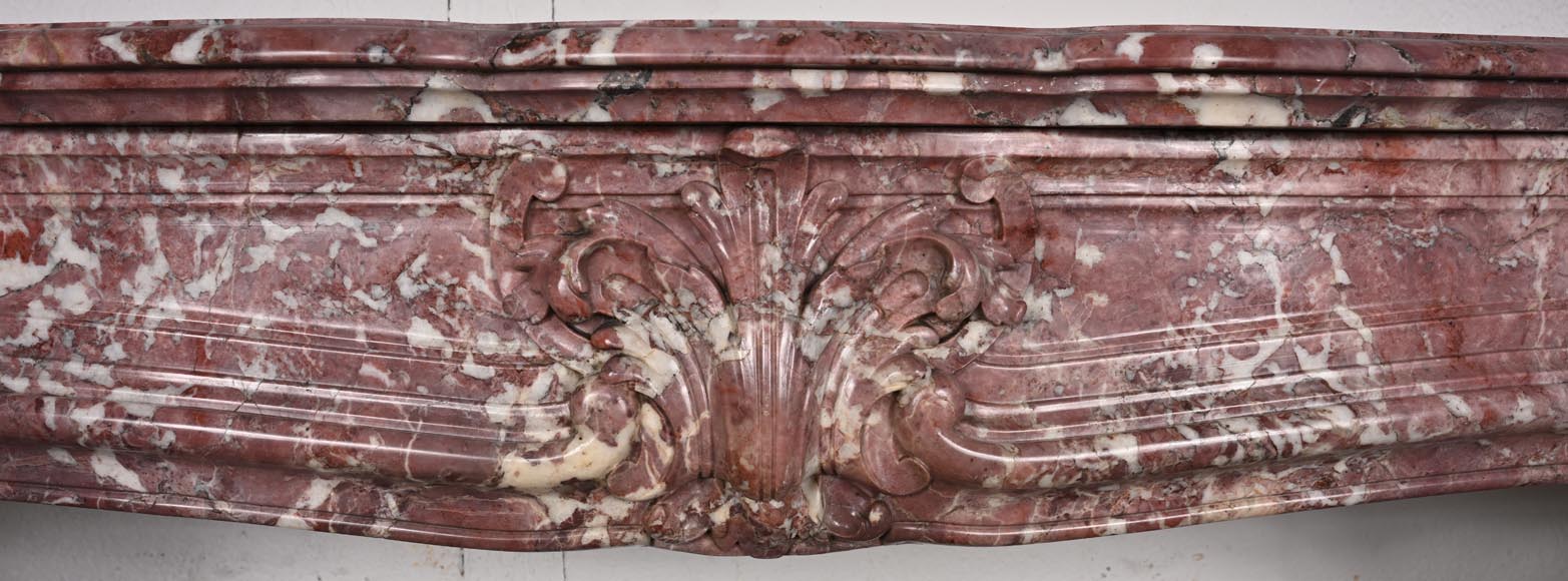 Louis XV-style fireplace decorated with a palmette, carved from peach-blossom marble-1