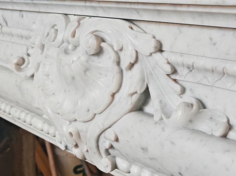 Louis XIV-style fireplace in Carrara marble, featuring a beaded molding-3