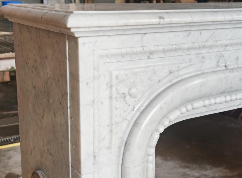 Louis XIV-style fireplace in Carrara marble, featuring a beaded molding-5