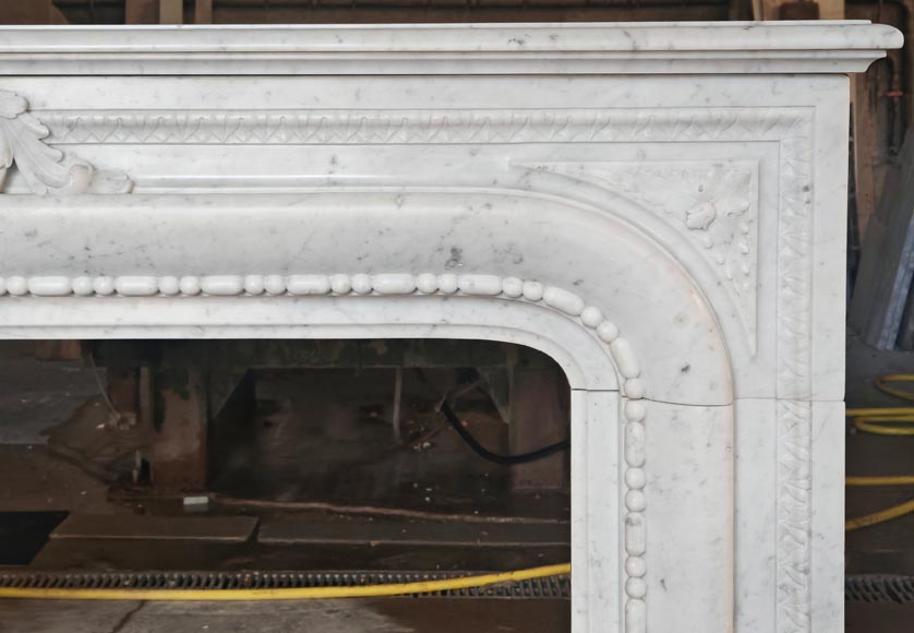 Louis XIV-style fireplace in Carrara marble, featuring a beaded molding-9