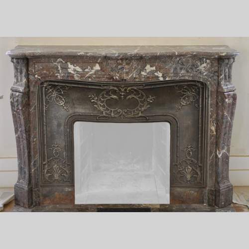 Antique Louis XV style fireplace in Red from the North marble, 19th century