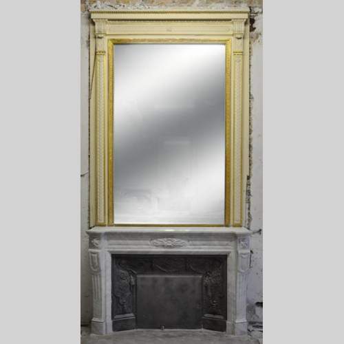 Large Louis XVI style fireplace in white Carrara marble with its cast iron insert and its overmantel mirror