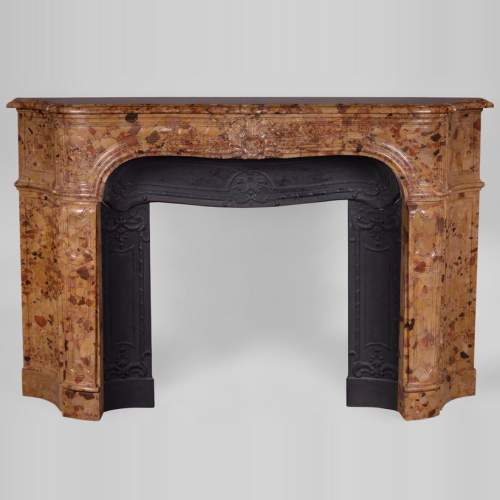 Rare antique Regence period fireplace in Aleppo Breccia marble with its original cast iron insert