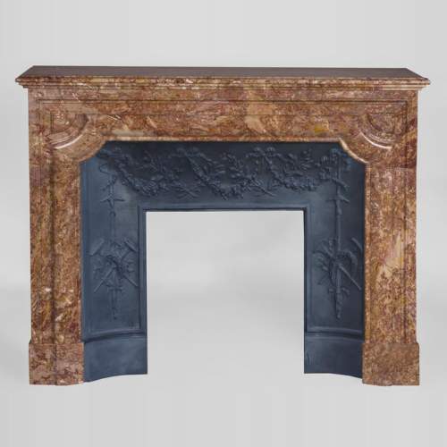 Antique Louis XIV style fireplace in Brèche marble