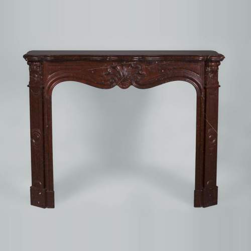 Antique Louis XV style fireplace with three shells decor in Red Griotte marble