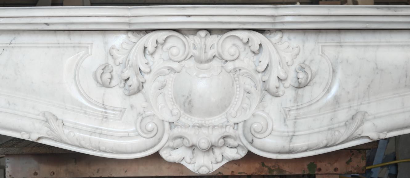 Highly sculpted Louis XV style fireplace in Carrara marble Highly sculpted Louis XV style fireplace in Carrara marble-1
