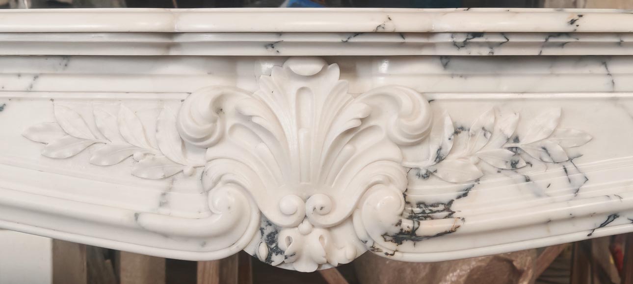 Louis XV style fireplace in Paonazzo marble decorated with a foliate shell Louis XV style fireplace in Paonazzo marble decorated with a foliate shell-1