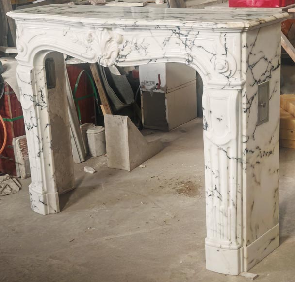 Louis XV style fireplace in Paonazzo marble decorated with a foliate shell Louis XV style fireplace in Paonazzo marble decorated with a foliate shell-8