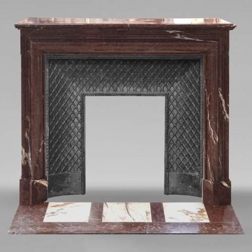 Louis XIV style Bolection mantel in Rouge Griotte marble