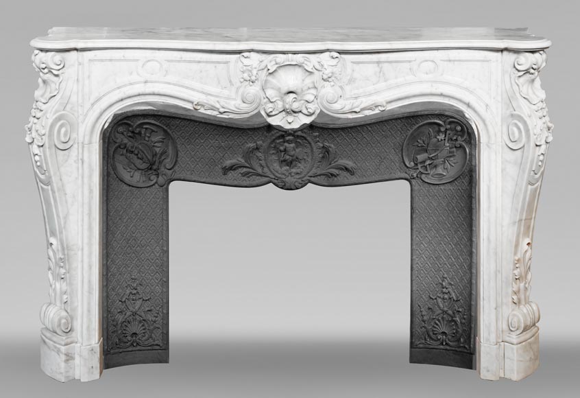 Louis XV style fireplace in Carrara marble, richly decorated with shells and flowers Louis XV style fireplace in Carrara marble, richly decorated with shells and flowers-0
