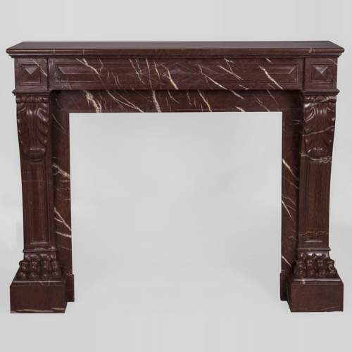 Antique Napoleon III style fireplace made out of Rouge Griotte marble with lion’s paws and Acanthus leaves