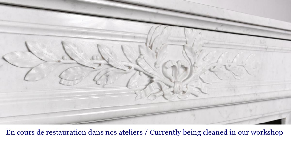 Louis XVI style fireplace in Carrara marble, with a half-column and laurel wreath-2