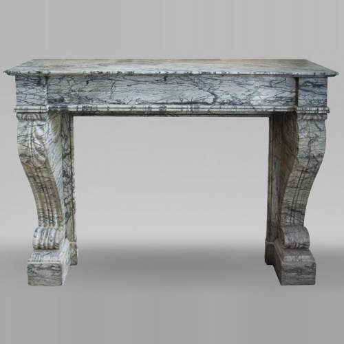 Antique Restoration style fireplace mantel in Bleu Fleuri marble