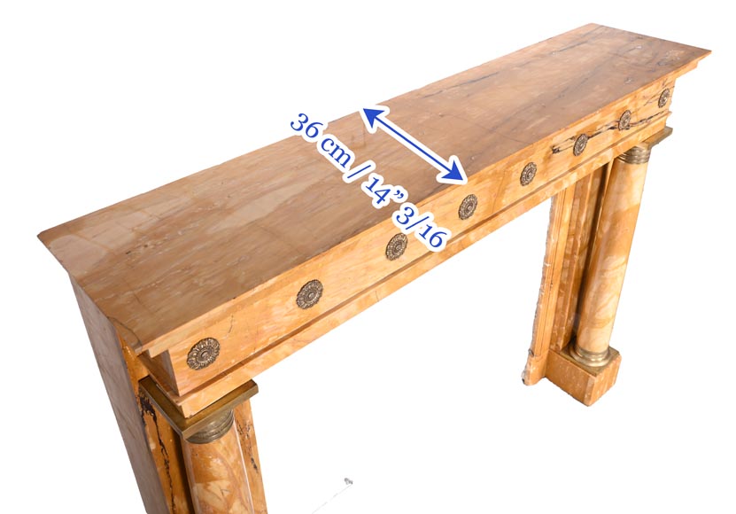 Empire style fireplace in Sienna yellow marble with columns and gilt bronze rosettes-11