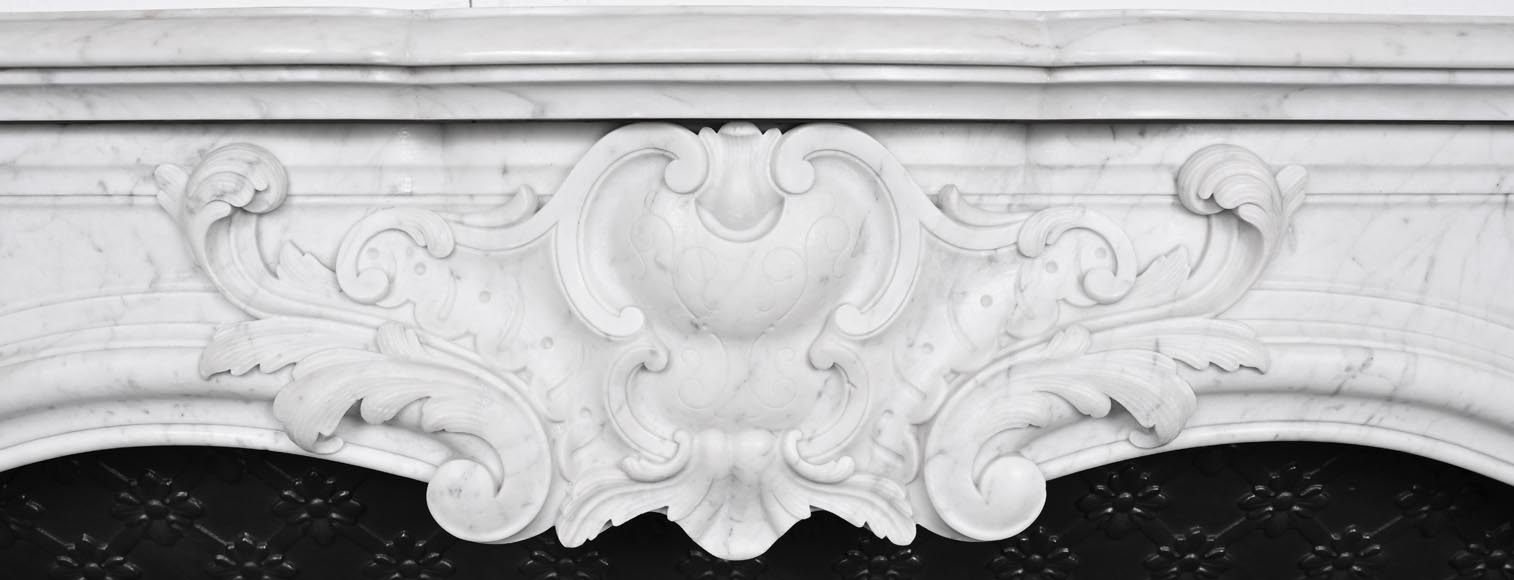 Louis XV-style Carrara marble fireplace, decorated with a palmette-1