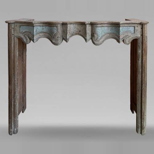 Louis XV period mantel in chestnut wood with antique blue polychromy, 18th century