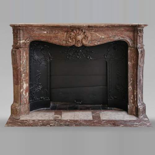Beautiful Louis XV style fireplace in Red of the North marble