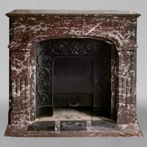 Regence style fireplace in Red of the North marble