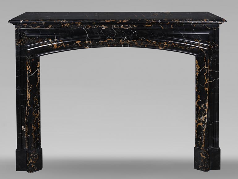 Louis XIV style fireplace in Portoro marble, with a molding and rounded frieze Louis XIV style fireplace in Portoro marble, with a molding and rounded frieze-0