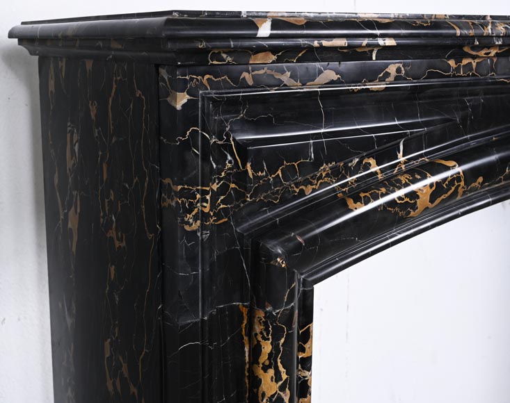 Louis XIV style fireplace in Portoro marble, with a molding and rounded frieze Louis XIV style fireplace in Portoro marble, with a molding and rounded frieze-3