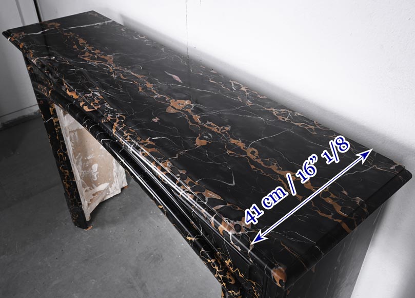 Louis XIV style fireplace in Portoro marble, with a molding and rounded frieze Louis XIV style fireplace in Portoro marble, with a molding and rounded frieze-8