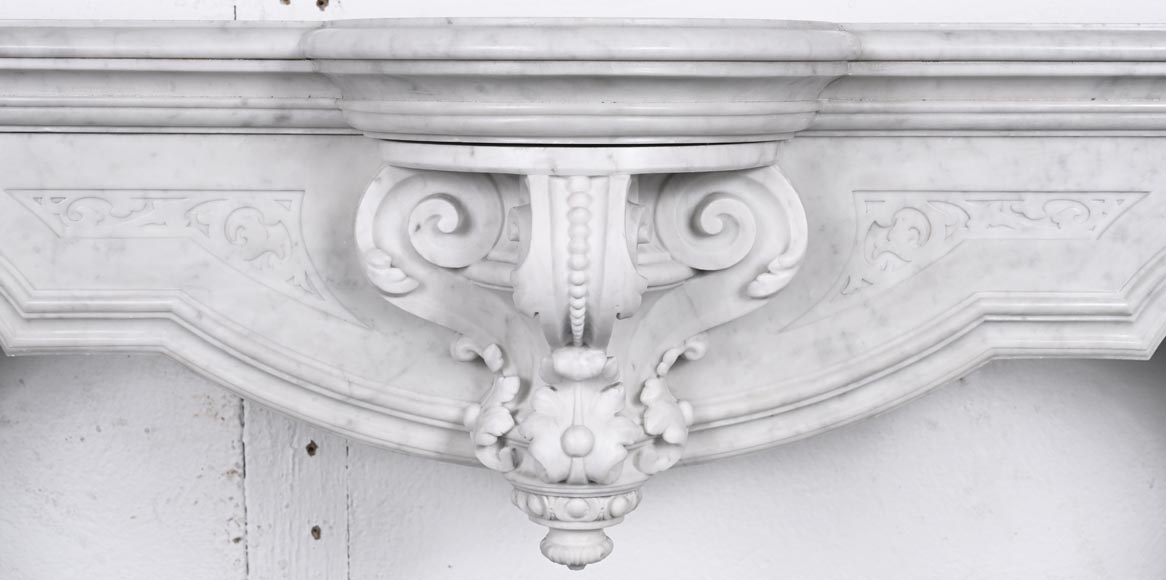 A richly sculpted Carrara marble fireplace in the Napoleon III style, decorated with a lion's head.-1