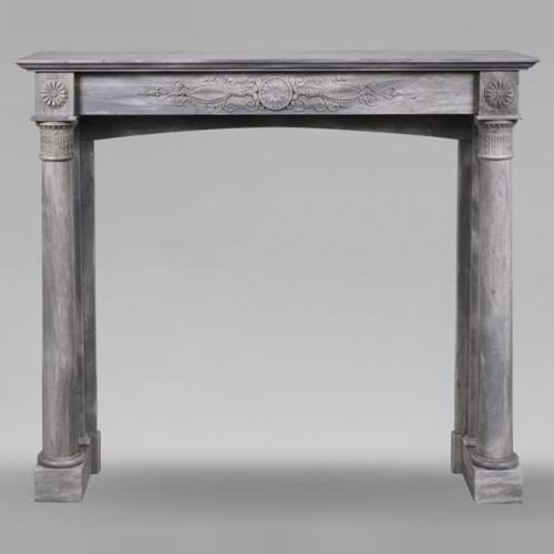 Restoration period mantel in light Turquin marble with detached columns and carved entablature