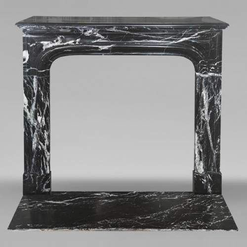 Louis XIV style boudin mantel in Black Marquina marble.