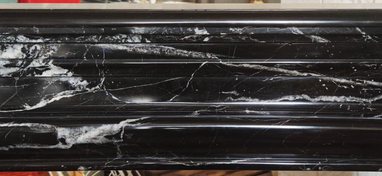 Louis XIV style boudin mantel in Black Marquina marble. Louis XIV style boudin mantel in Black Marquina marble.-1
