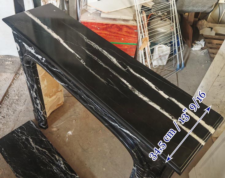Louis XIV style boudin mantel in Black Marquina marble. Louis XIV style boudin mantel in Black Marquina marble.-9