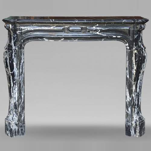 Black Marquina marble Pompadour mantel in the Louis XV style