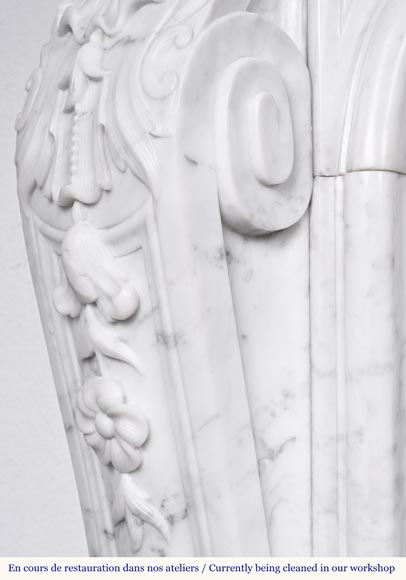 A highly sculpted Louis XV style fireplace in Carrara marble, decorated with a shell motif.-8