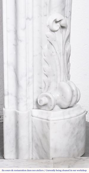 A highly sculpted Louis XV style fireplace in Carrara marble, decorated with a shell motif.-13