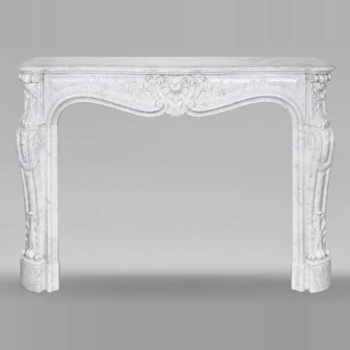 Louis XV style fireplace in Carrara marble, decorated with a floral shell motif