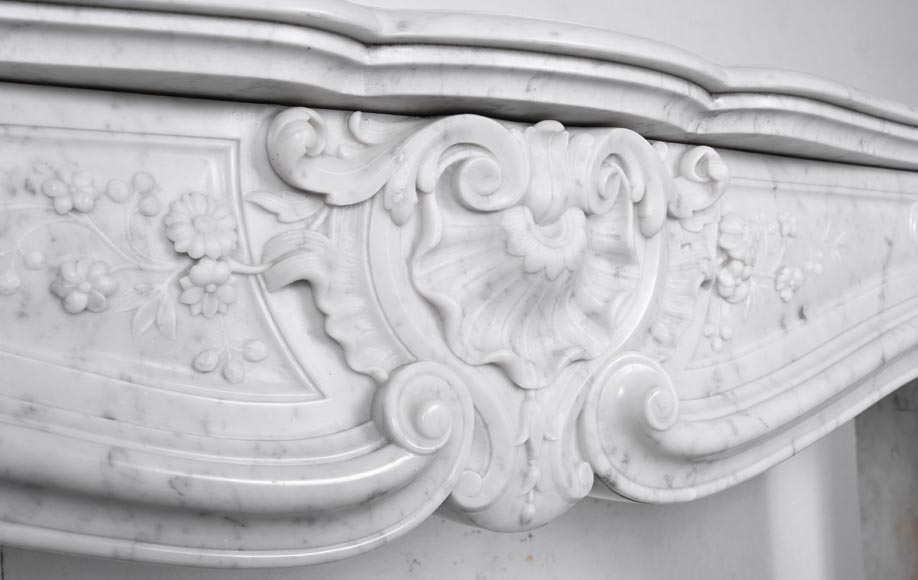 Louis XV style fireplace in Carrara marble, decorated with a floral shell motif-2