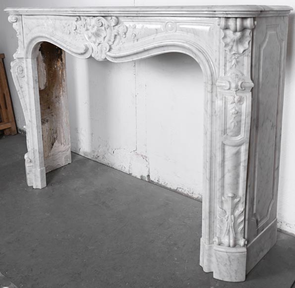 Louis XV style fireplace in Carrara marble, decorated with a floral shell motif-10