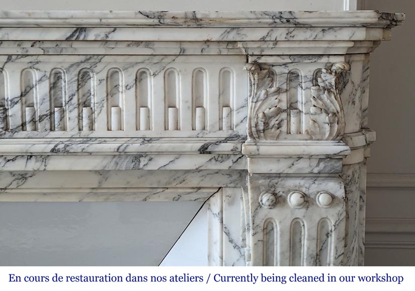 Louis XVI style mantel with curved flutes and carved capitals in highly veined Arabescato marble-9