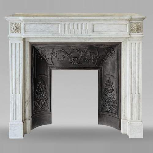 Louis XVI style Carrara marble mantel with curved fluting