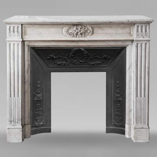 Louis XVI style Carrara marble mantel with filleted flutes and acanthus leaves