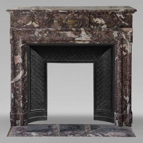 Louis XIV style mantel in Rouge de Rance marble adorned with bronze ornaments
