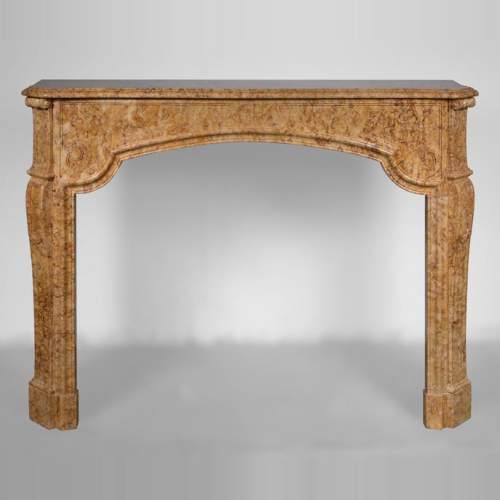 Regence period mantel in yellow marble
