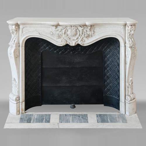 Highly Carved Louis XV-style mantel in Carrara marble